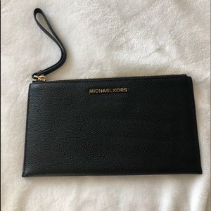 Michael Kors clutch. Barely used.